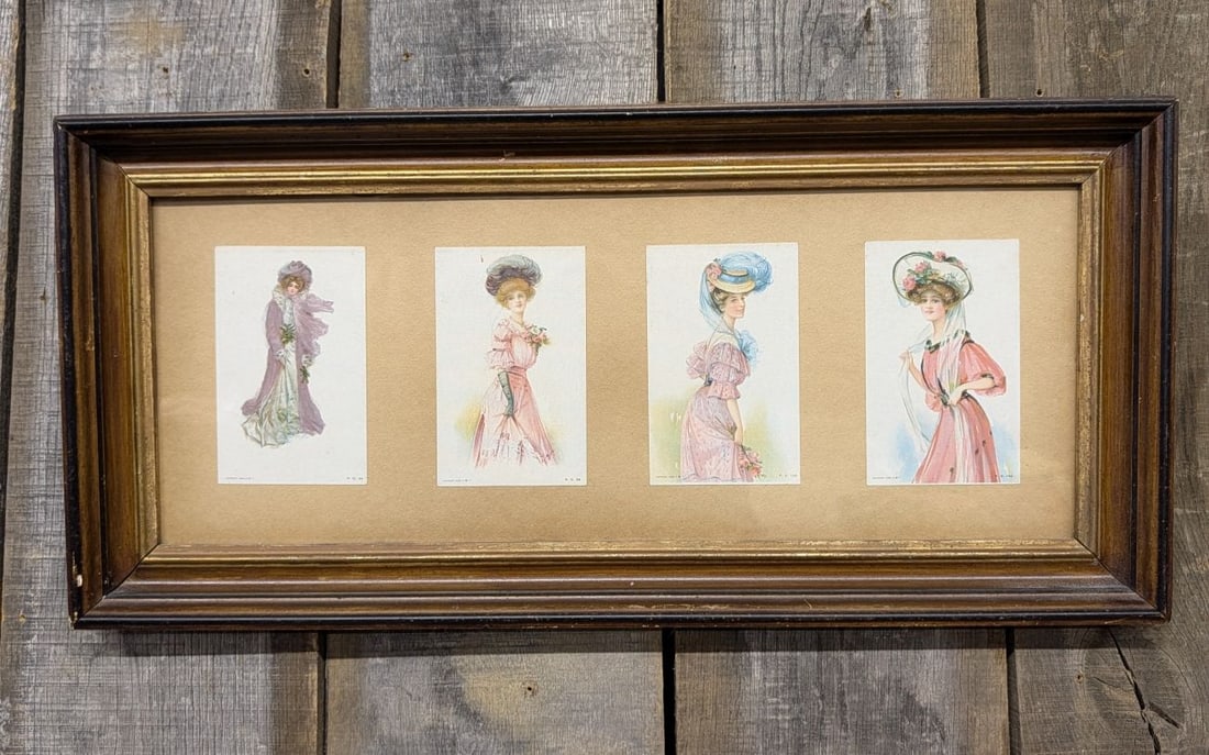 A Collection of Four Edwardian Fashion Prints in a Wood Frame: This collection features four color lithographs depicting Edwardian-era fashion, each bearing a copyright date of 1905. The prints depict women in elaborate period attire, including wide-brimmed flora