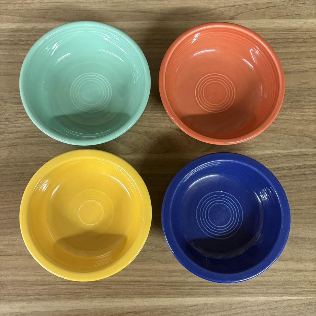 A Set of Four Fiesta Ceramic Fruit Bowls in Assorted Colors (1 of 7)