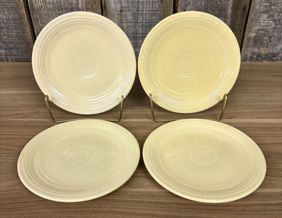 A Set of Four Homer Laughlin Fiesta Yellow Bread and Butter Plates (1 of 8)