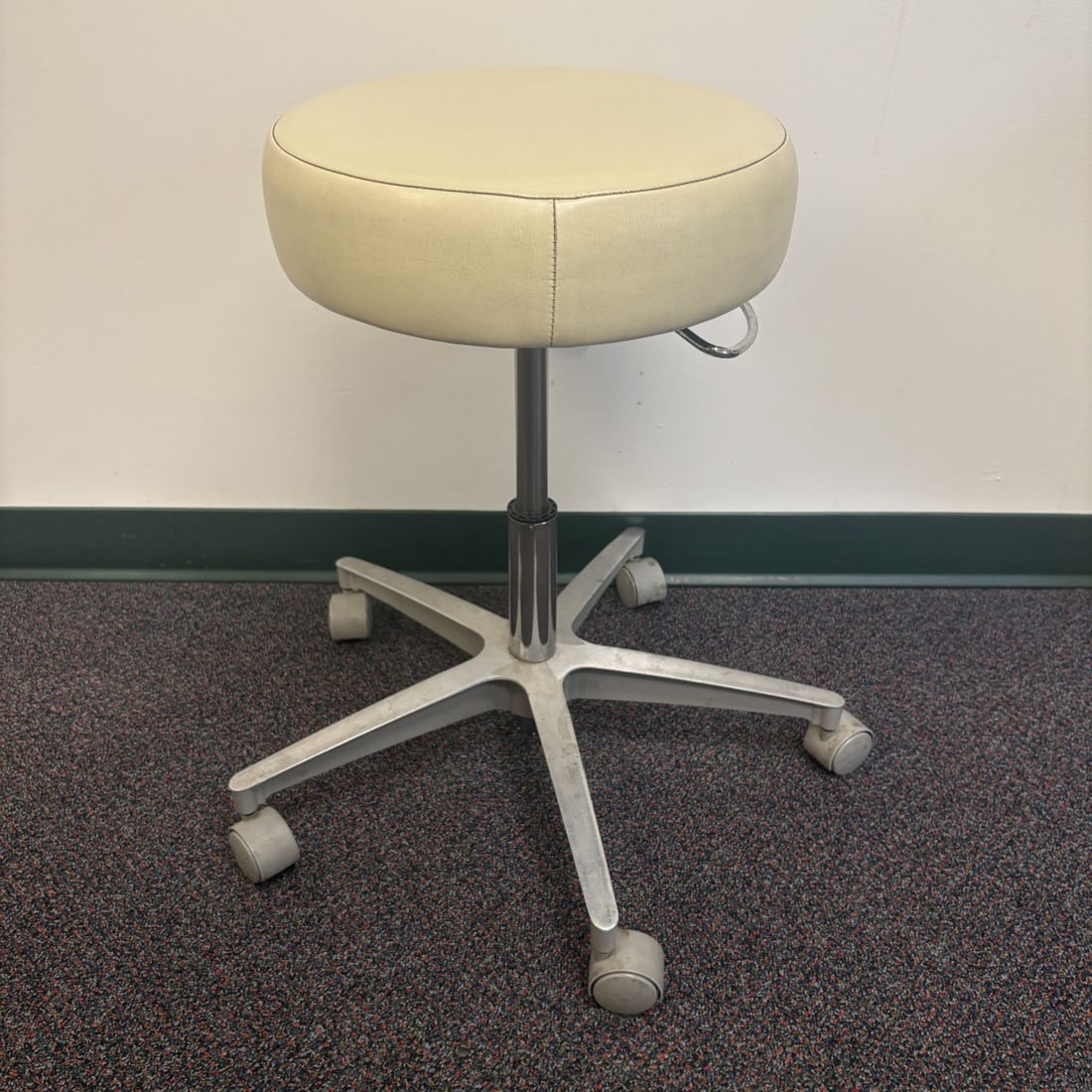 Adjustable Rolling Industrial Stool with Cream Vinyl Upholstery (1 of 4)
