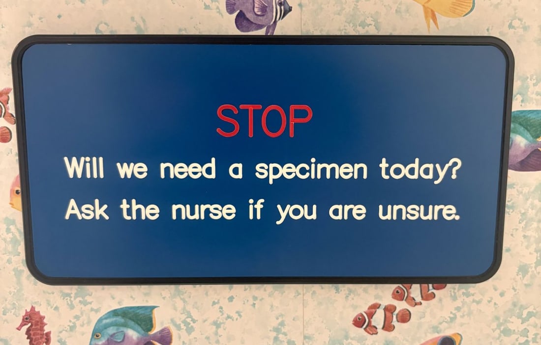 A Rectangular Medical Specimen Instruction Wall Sign: This rectangular wall-mounted sign is designed for a medical or healthcare environment. The sign features a blue background with a black border and rounded corners. The face of the sign is composed of