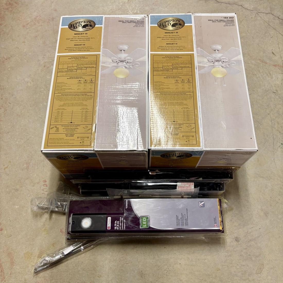 An Assortment of Hampton Bay Ceiling Fans, Utilitech LED Light Fixtures, and Cabinet Hardware (1 of 5)
