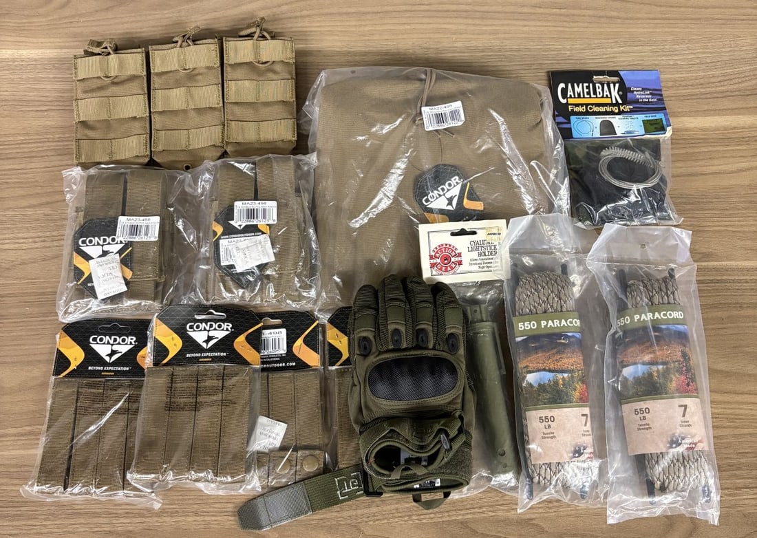 A Collection of Condor Tactical Pouches and Outdoor Gear Accessories: A group of contemporary tactical and outdoor utility gear. The collection features several coyote tan nylon components from Condor Outdoor, including multiple double pistol magazine pouches with hook-