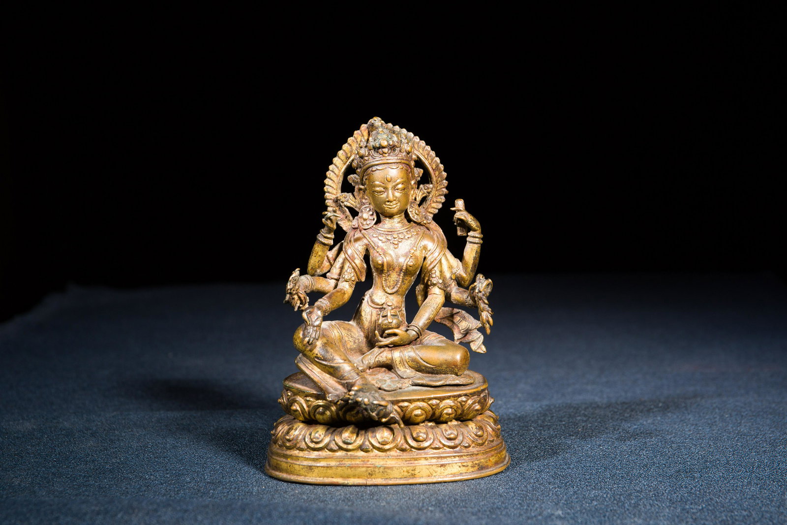 A GILT BRONZE FIGURE OF Vasudhara (1 of 14)