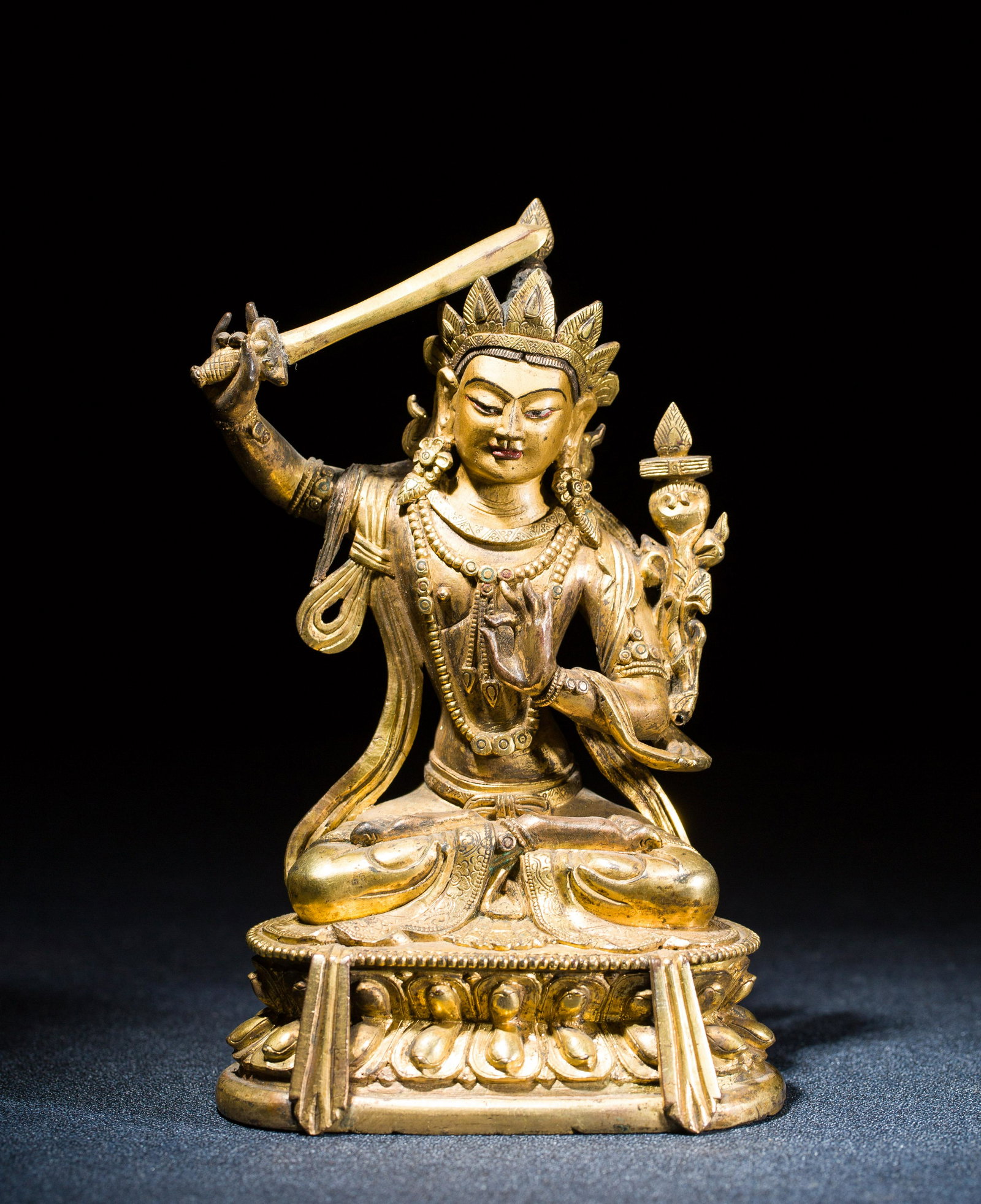 A GILT BRONZE MANJUSRI (1 of 11)