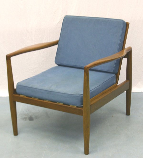 A Mahogany Robin Day Chair for Hille: Of mahogany, construction with cane backing and rubber webbing and blue cotton cushions. Designed by Robin Day. Manufactured by Hille. Circa 1950's.