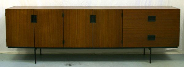 Cees Braakman DUO3 Sideboard for Pastoe: A fine sideboard of teak construction with steel support and black plastic drawer pulls. Designed in 1958 by Cees Braakman for Pastoe. This model is the DUO3 from the U+N Series. H. 72.5. W. 222.5. D.