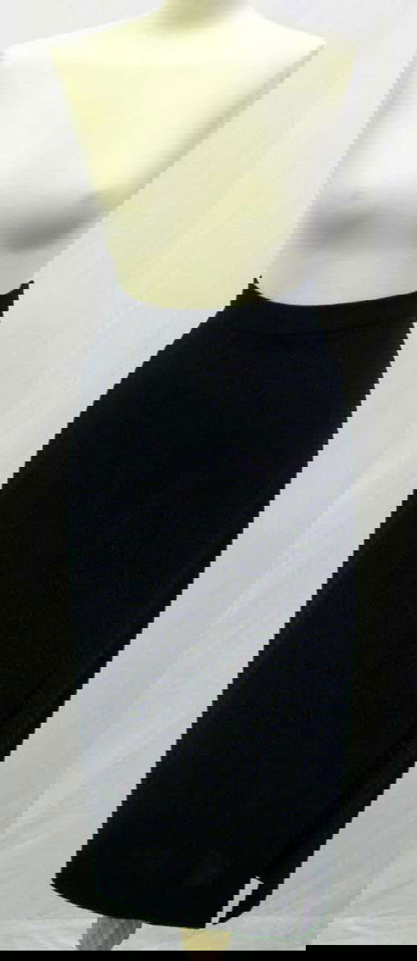 A Vintage DKNY Black Wool Skirt: Of black wool. Unlined. Circa 1994. Retail price when originally purchased: approx. £400. UK size: circa 8. Please note that the sizing and measurements of vintage clothing and shoes can vary dependi