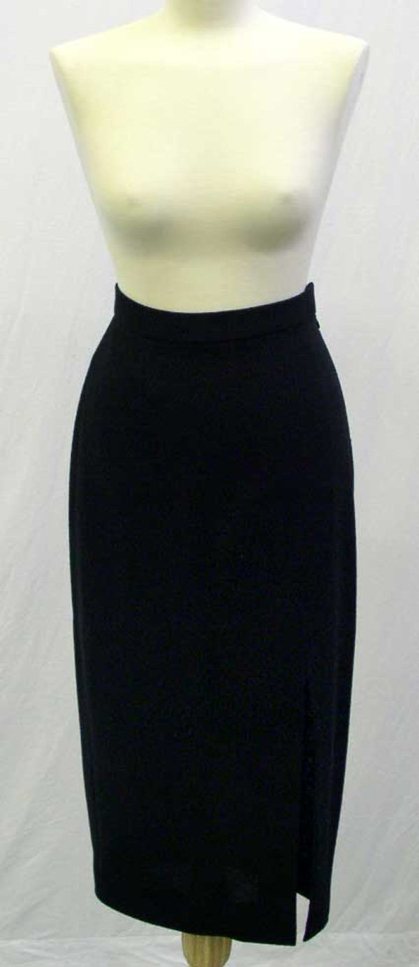 A Vintage DKNY Black Wool Skirt: Of black wool. Unlined. Circa 1994. Retail price when originally purchased: approx. £400. UK size: circa 8. Please note that the sizing and measurements of vintage clothing and shoes can vary dependi