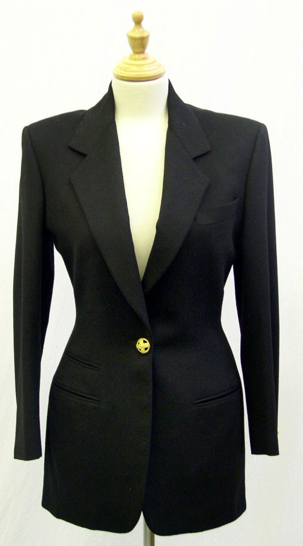 A Vintage DKNY Black Blazer: Of wool and cashmere with gilt metal buttons. Circa 1994. Retail price when originally purchased: approx. £1100. Labeled: size 2, but considered UK size: circa 6. Please note that the sizing and meas