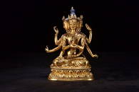 A GILT BRONZE FIGURE OF NAMGYALMA BUDDHA