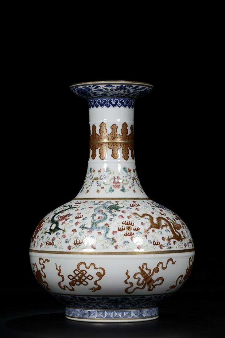 QIANLONG MARK FAMILLE ROSE IRON RED OUTLINE IN GOLD: Time: Qianlong Period 18 Century / Height 12.99 in / Belly-Diameter 9.06 in / Mouth-Diameter 4.72 in