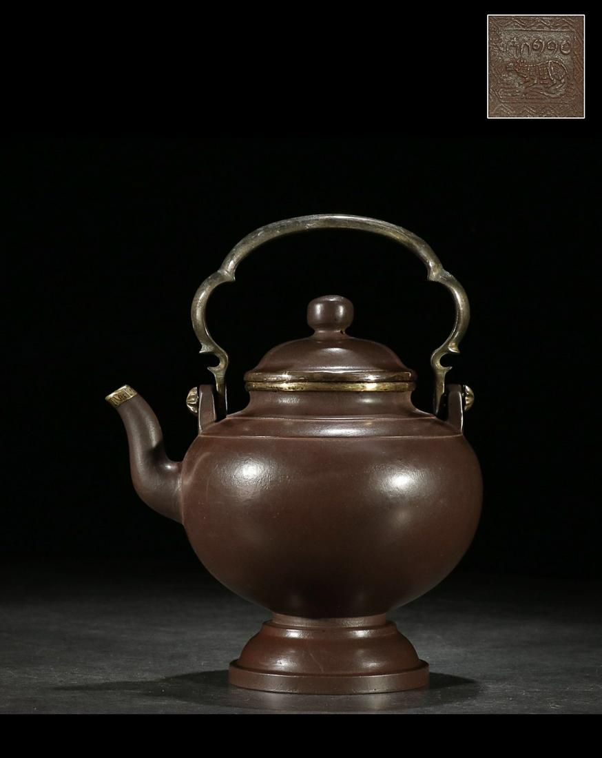 BRONZE HANDLE WATER-POLISHING ZISHA TEAPOT WRAPPED: Length 5.91 in / Width 4.72 in / Height 7.2 in