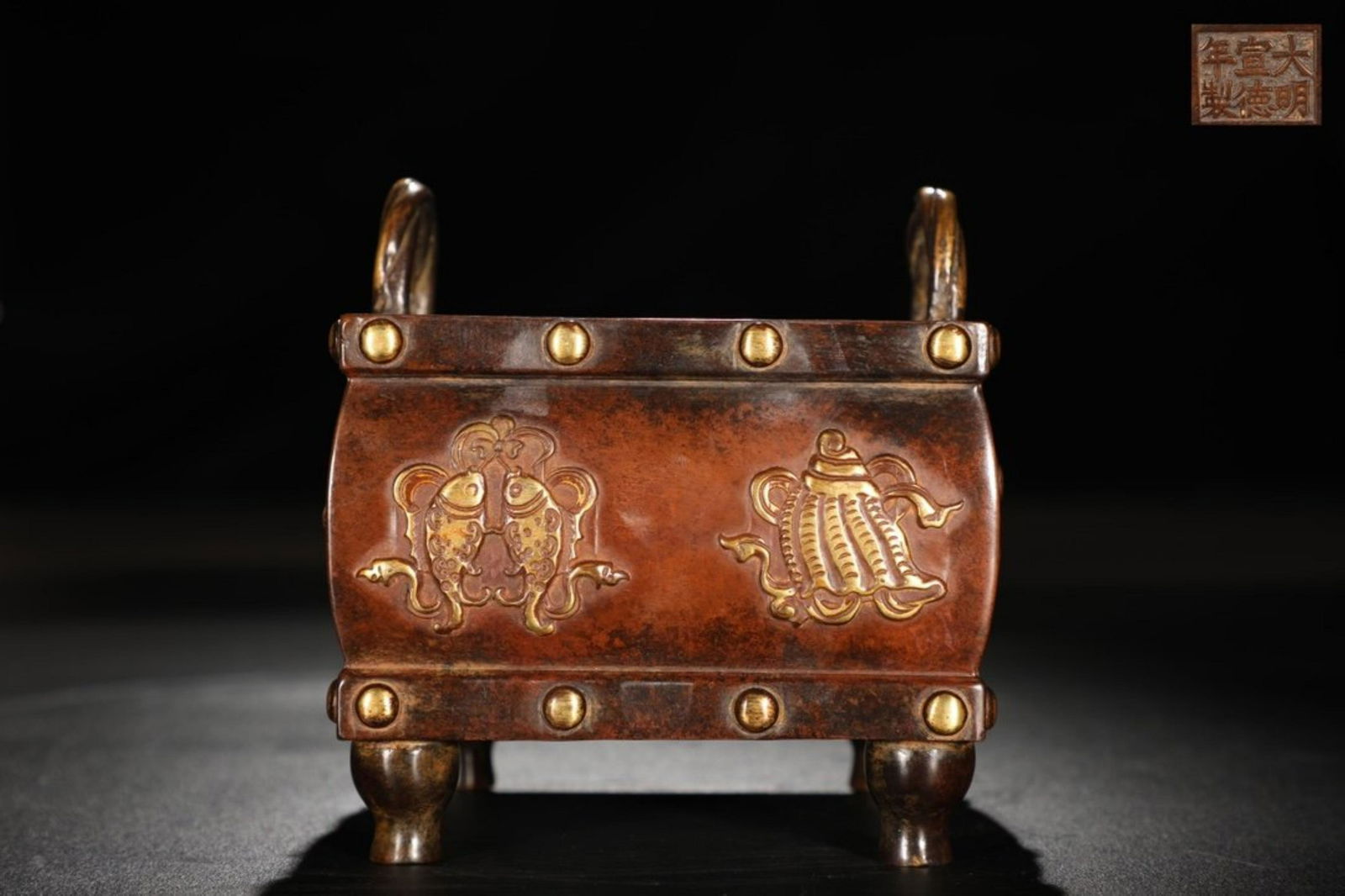 GILT BRONZE BA'BAO PATTERNING EAR SQUARE DRUM-SHAPED: Time: Xuande Period 15 Century / Weight 4500g / Height 5.51 in / Mouth-Diameter 5.31 in / 5.31 in