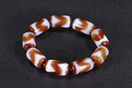 TIBETANTIGER-TOOTH DZI BRACELET: Dimension (1) 0.97 in / Dimension (2) 0.55 in