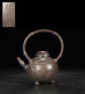 XU'YINLING BAMBOO-JOINT HANDLE TEAPOT: Length 6.1 in / Width 4.25 in / Height 6.89 in