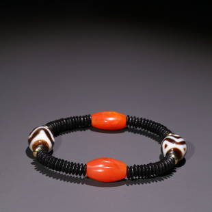 TIBETAN DOUBKE TIGER-TOOTH DZI EMBEDED SOUTH RED AGATE: Weight 19.8g / Bead-Diameter 0 in / Bead-Diameter 0 in