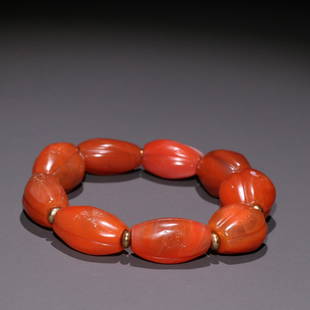 RED SOUTH AGATE MELON-RIDGED BRACELET: Weight 85.2g / Bead-Diameter 1.02 in / Width 0.63 in
