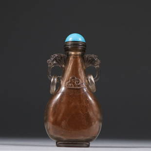 TEA-COULORED CRYSTAL DOUBLE-DRAGON EAR SNUFF BOTTLE: Time: Qing Dynasty 17-19 Century / Weight 83.8g / Height 3.9 in / Width 1.97 in