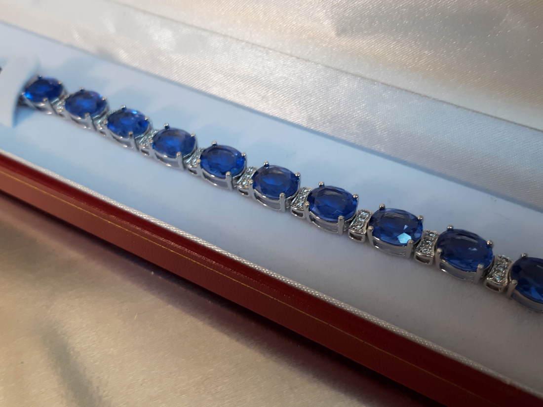 Diamond & Sapphire Tennis Bracelet: Ladies approx. 16.0 ct Diamond & Sapphire Tennis Bracelet in Sterling Silver. Weight 24.0g