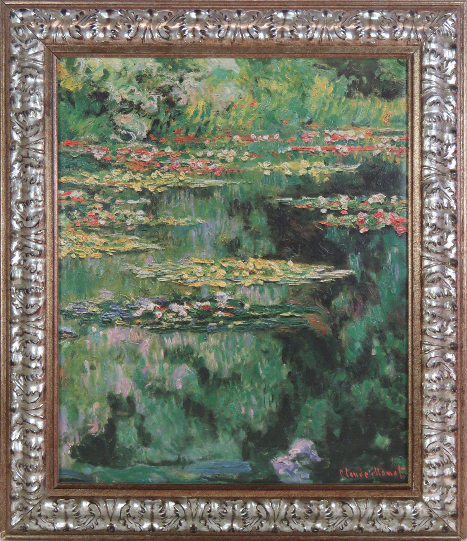 CLAUDE MONET TEXTURED GICLEE W SILVER GILT FRAME: Finely framed Claude Monet textured / impasto giclee on canvas. To the uninitiated it looks like the real deal. The frame is complimentary and adds to the allure of the painting. Museum shops Brushstr
