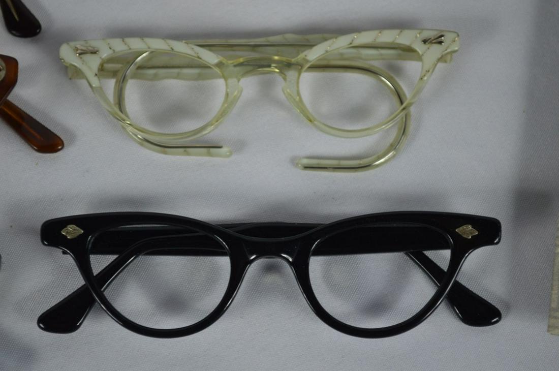 LOT 7 VINTAGE CATEYE EYEGLASSES: Lot of 7 vintage C. 1950's-1960's eyeglasses. Some with cat eye frames. New Old Stock (NOS). Provenance: From a NY, NY / Rockland county eyewear dealer/collection.