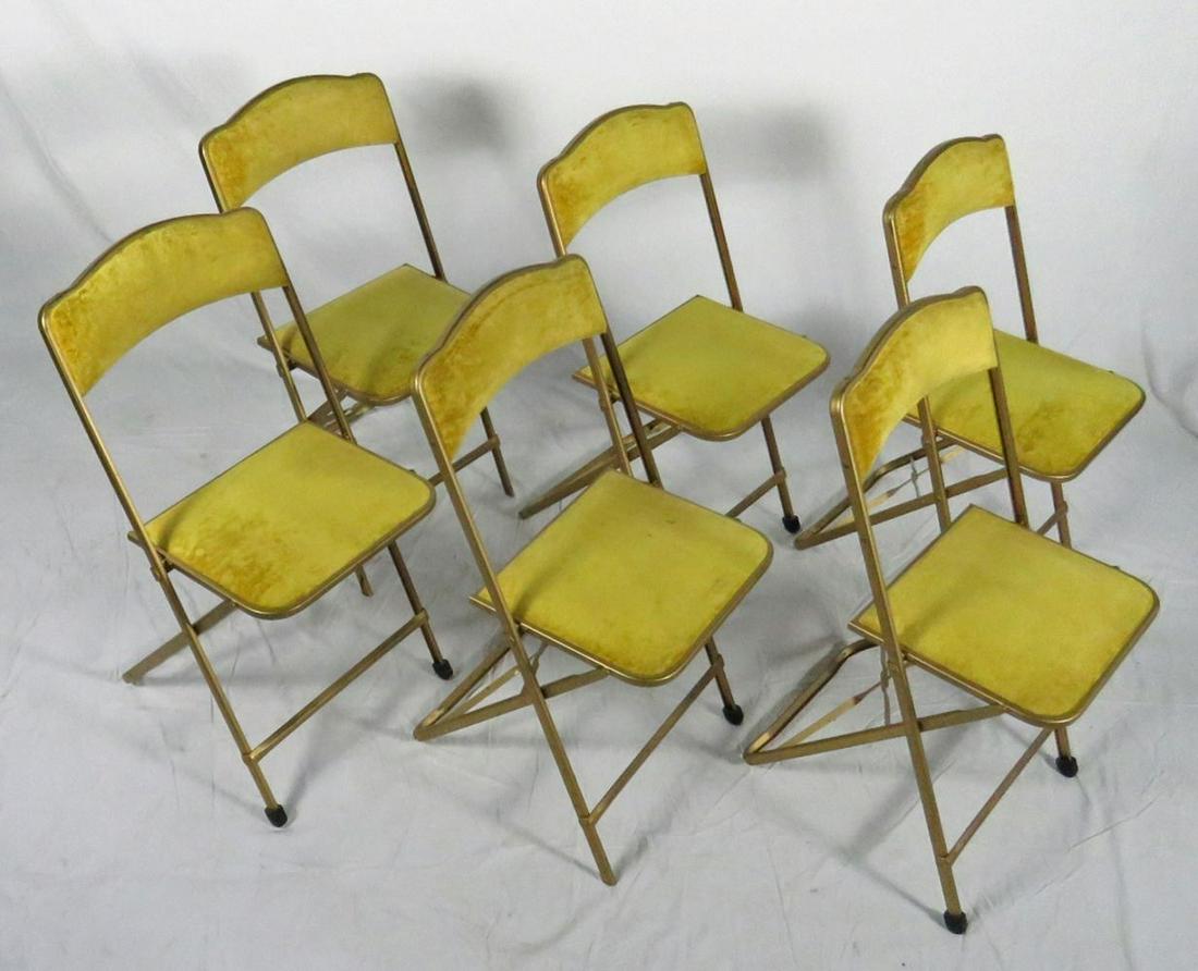 SET (6) VINTAGE A. FRITZ & CO. FOLDING CHAIRS: Set of six (6) vintage stackable folding chairs by A. Fritz & Company. they are upholstered in gold velvet fabric.Measures: Chair H 32", Seat H 17", Seat W 15", Seat D 12 1/2"
