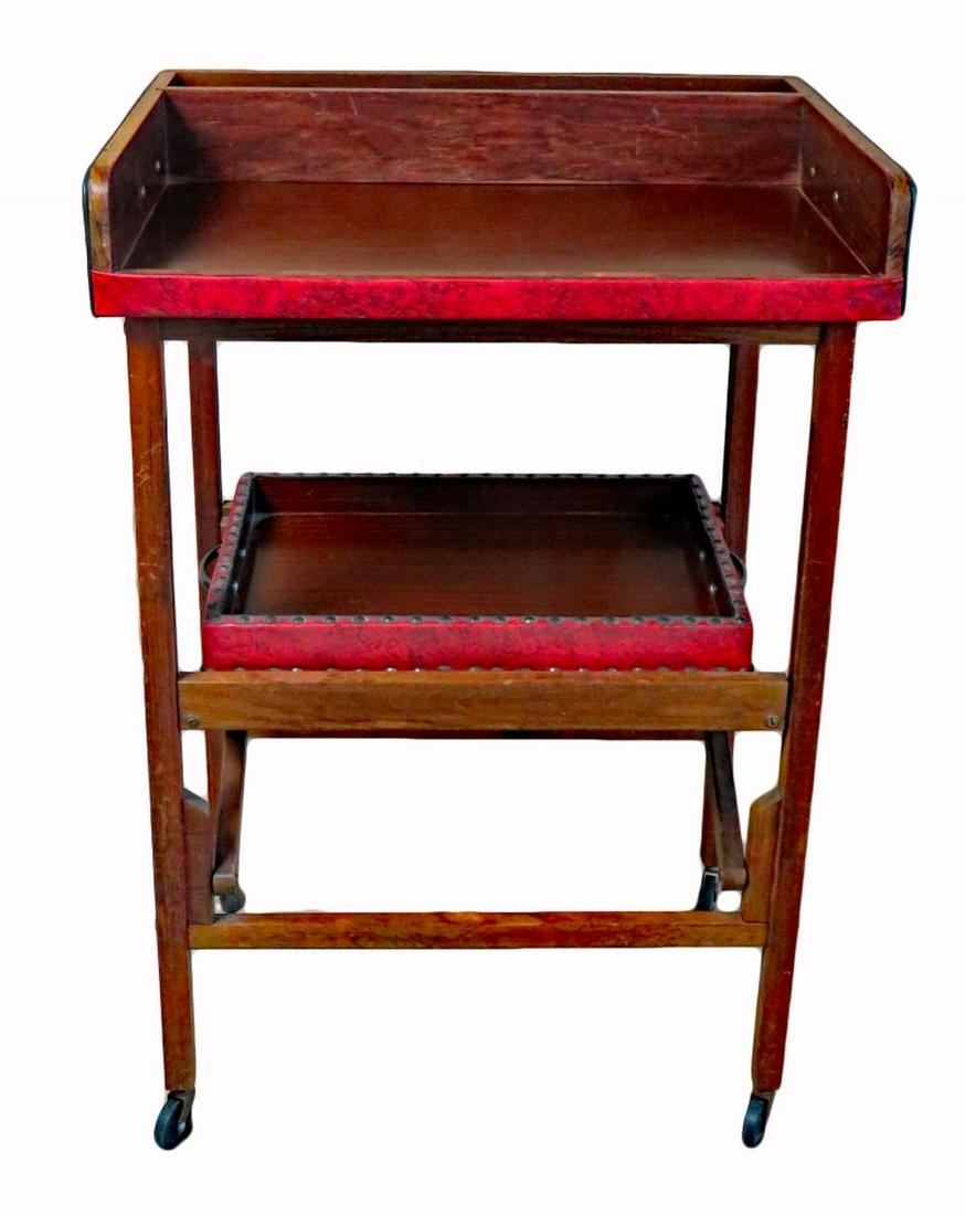 MID CENTURY MODERN ROLLING BAR & SERVING CART: Mid century modern serving / bar cart. Straight our of the 1950's, 60's, or 70's- take your pick. Studded naughahyde finish. Frame folds flat for easy transport as both trays are removable. Measures: 