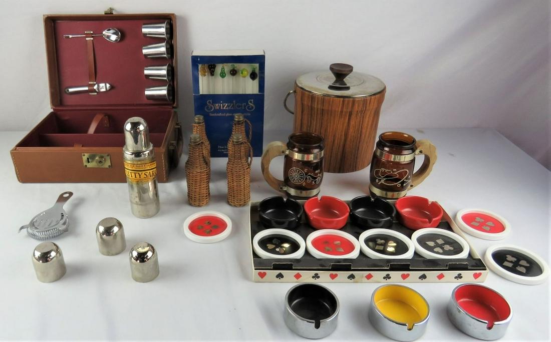 MID CENTURY BAR LOT INC SMOKING & POKER ITEMS: Large lot of mid century modern bar items. Poker related coasters, in original box, ashtrays, stainless steel flask, etc. As found condition.