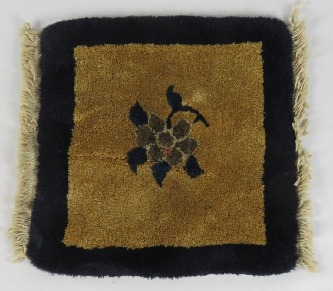 ANTIQUE / VINTAGE PEKING SMALL RUG / MAT / CARPET: Small hand woven Peking Chinese (Oriental) oven mat / rug. Likely woven as a display piece meant to sit under Buddhist or scholar carving, or as a display piece. Measures: 13" x 13"
