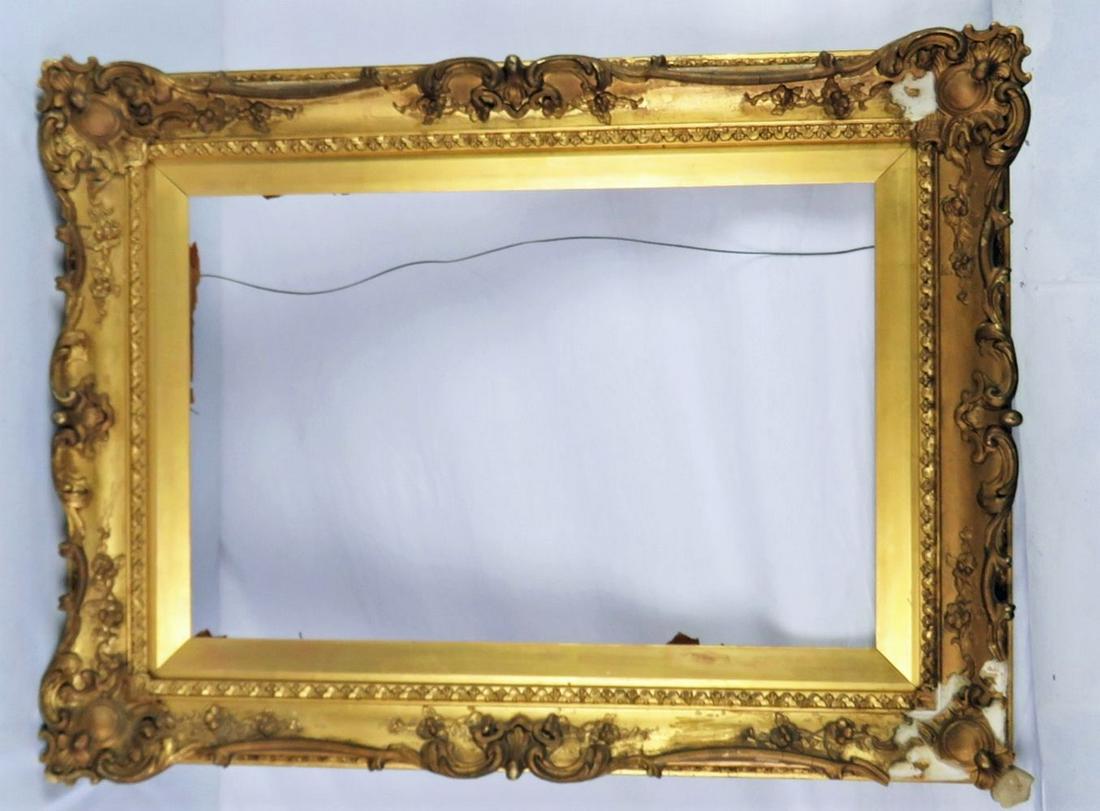 ANTIQUE GILT PAINTING FRAME 19TH C: Antique lemon gold gilt painting frame. Likely 19th century. Measures: 24 1/4" x 32 1/4" Exterior 16" x 24" Rabbet