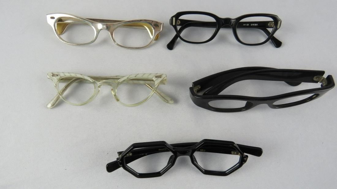 LOT 5 VINTAGE EYEGLASSES 1950'S CATEYE ETC: Lot of 5 vintage eyeglass / sunglass frames, circa 1950's 1960's. Cateye and related styles. Some marked made in France. Some New Old Stock (NOS). Provenance: From a NY, NY & Rockland County eyewear d