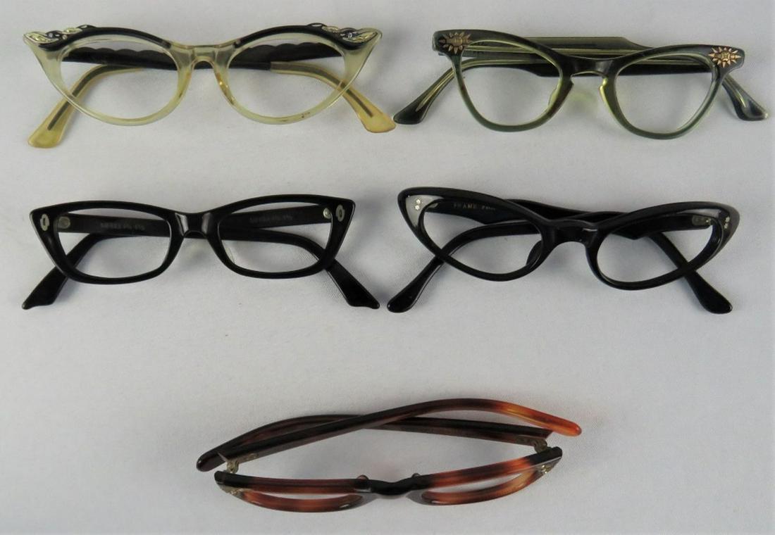 LOT 5 VINTAGE CATEYE FRANCE EYEGLASSES FRAMES: Lot of 5 vintage eyeglass / sunglass frames, circa 1950's 1960's. Cateye and related styles. One pair, etched aluminum temple arms. Some marked made in France. Some New Old Stock (NOS). Provenance: Fr