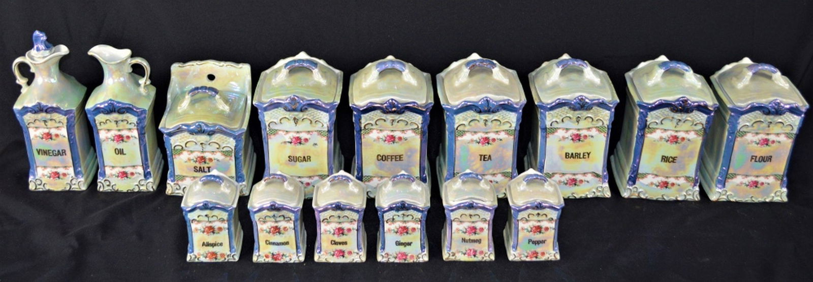 VINTAGE GERMAN LUSTREWARE CANISTER & SPICE SET: 29 piece vintage German (marked Germany) Lusterware ware spice and canister set. Set is complete, but for one stopper (oil/vinegar). Height: 8" largest canister