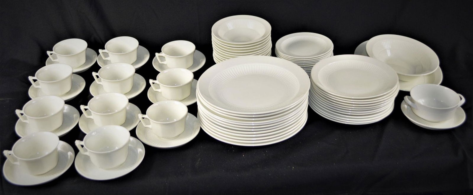 73 PIECE ADAMS ENGLISH IRONSTONE CHINA SET: A 73-piece Adams English Ironstone porcelain dinnerware and cup / saucer china set. 12 pieces with each set, the tea cups are missing one piece.