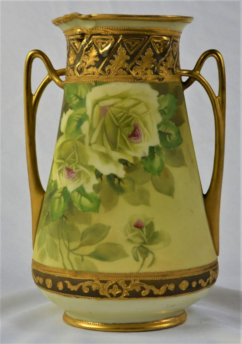 NIPPON MORIAGE VASE 2 HANDLE: Vintage / antique, hand painted, gold embellished, Nippon (signed/marked) moriage vase. Fine Japanese porcelain with an unusual 2 handle form. Rose floral decor. H: 9 1/4"