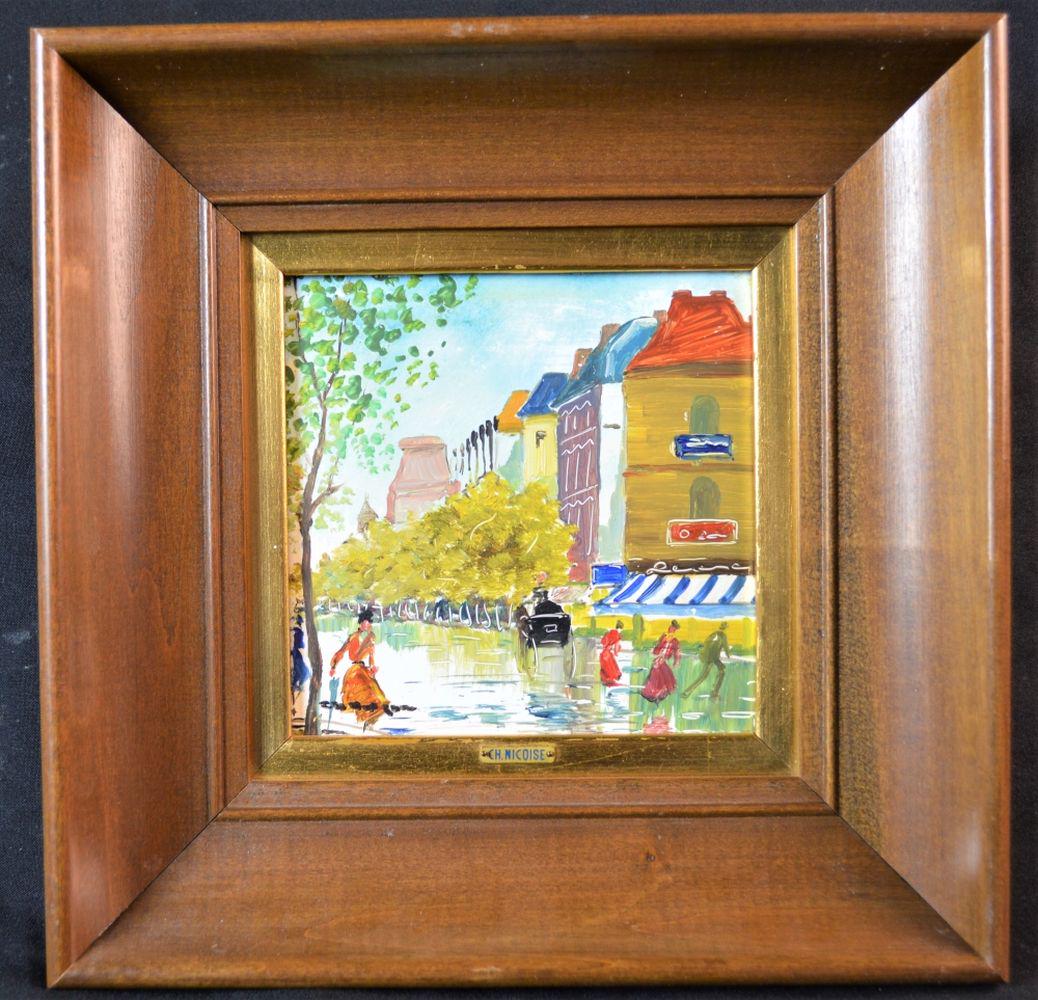 CHARLES NICOISE PAINTING OF PARIS ON PORCELAIN: Charles Nicoise (Italian, Mid-20th Century) oil on porcelain painting depicting a Parisian street scene. The frame is wood with a gilt inner liner. The work is unsigned but the frame is labeled with t