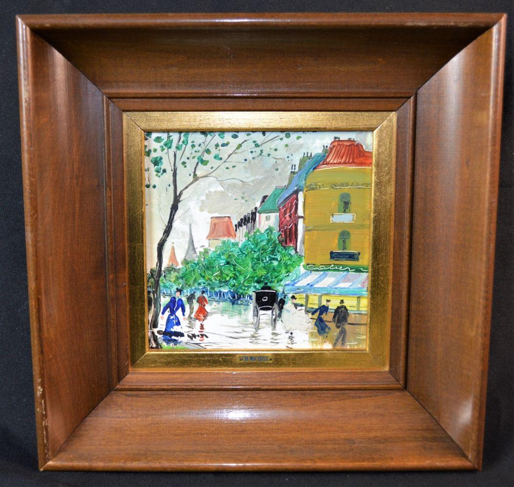 CHARLES NICOISE PAINTING OF PARIS ON PORCELAIN: Charles Nicoise (Italian, Mid-20th Century) oil on porcelain tile painting depicting a European street scene. The frame is wood with a gilt inner liner. The frame is labeled with the artist's name. Me