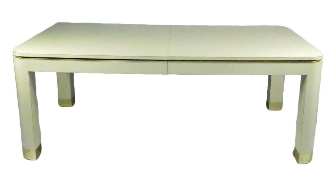 MODERN PACE STYLE WHITE DINING TABLE: Custom made 1980's modern design dining table in the manner of Pace. Table has one leaf. It is white laminate and has gold chrome metallic accents. Measures: Table - L 803/8", W 44 1/8", H 30 1/2" ; L