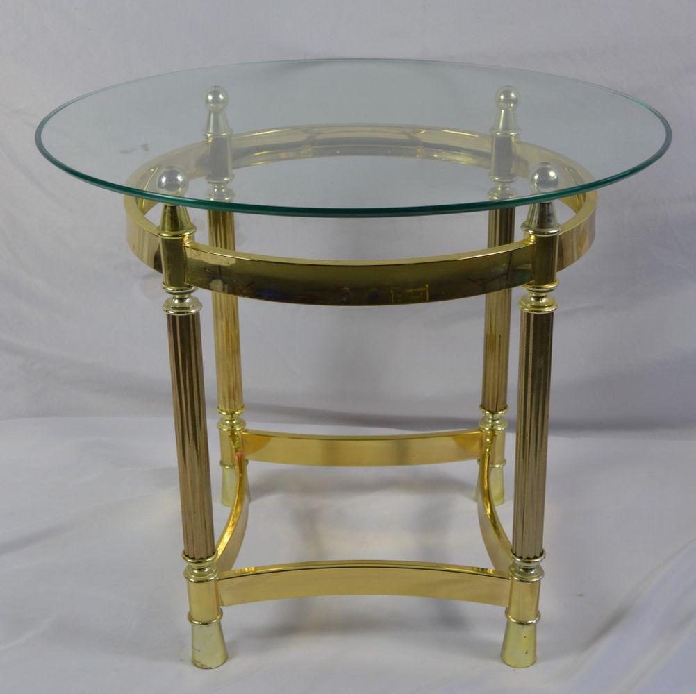 MAISON JANSEN STYLE BRASS TABLE W GLASS TOP: Jensen style brass side table with a beveled plate glass top. Good modern design with a classic twist. There are no labels/signatures on the table. Measures: 21 1/4" H x 25" D Provenance: Property of