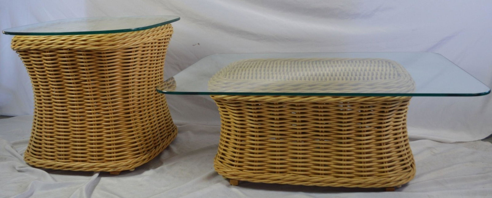 LOT FICKS REED RATTAN & GLASS COFFEE & SIDE TABLE: Vintage Ficks Reed bamboo / rattan and glass tables. Lot consists of one coffee table and one side table. Side table measures: 25 1/2" W x 25 1/2" x 23" H Coffee table measures: 41 1/2" w x 33" D x 16