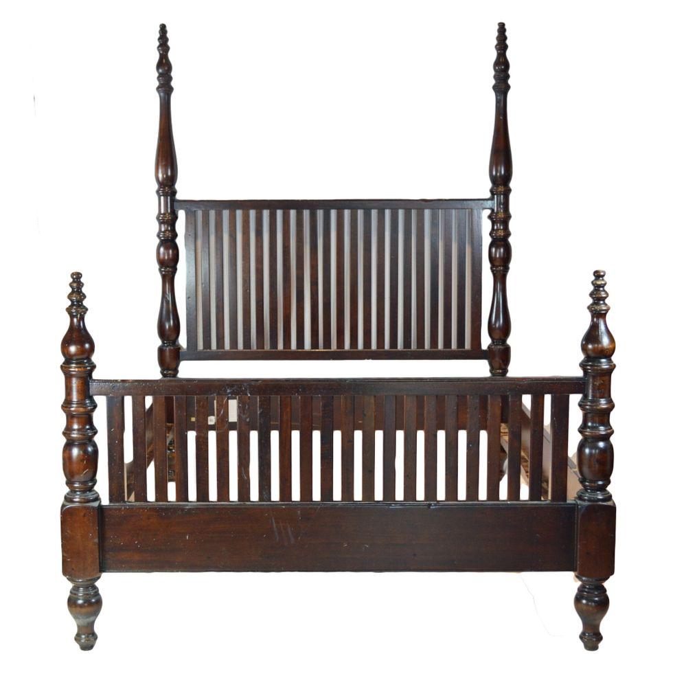 GUIDO ZICHELE VINTAGE 4 POSTER BED: An Italian designed 4 poster bed by Guido Zichele, sold by Bloomingdales. Solid wood, label/marked. Measures: Headboard H 84 1/2"; W 66; L 90"; Slat Height: 11 1/2" Footboard H: 47" Provenance: Proper