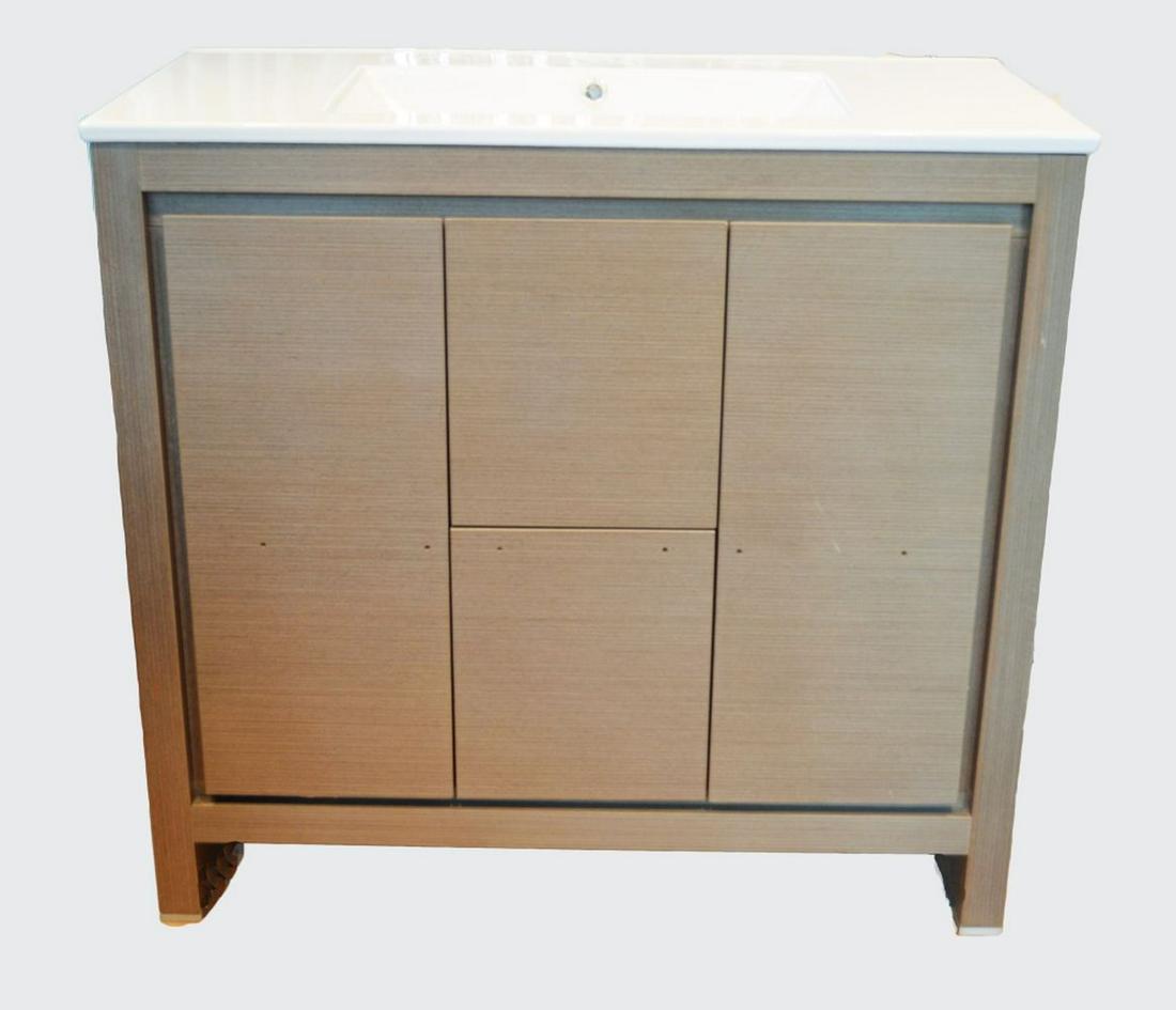 ROOM & BOARD BATHROOM VANITY: A new, appears unused/not installed, sink with vanity. Room & Board label. Measures: H 33 1/2"; W 36 1/4; D 18" 3/8