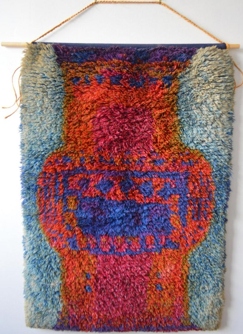 RITVA PUOTILA EARLY RYA RUG MANSIKKA SIGNED: Ritva Puotila (Finland b. 1935). A fine, early, mid-century modern Scandinavian rya. The work is titled and signed on the label, verso. Likely late 1950's/early 1960's. Measures: 50 1/2" x 43 1/2" Bio