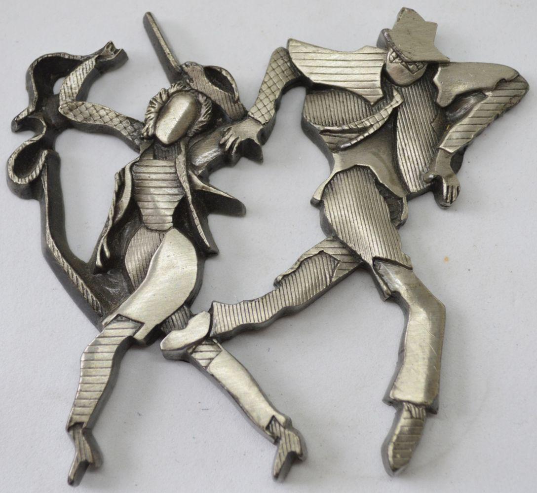 MIRIAM SCHAPIRO 1923-2015 DANCING SCULPTURE SIGNED: MIRIAM "Mimi" SCHAPIRO (IA/NY/Canada 1923-2015). A cast metal (steel) sculptural work of 2 figures dancing in tandem, titled "Anna and David". The work is stamped/signed, verso, with the artist's name