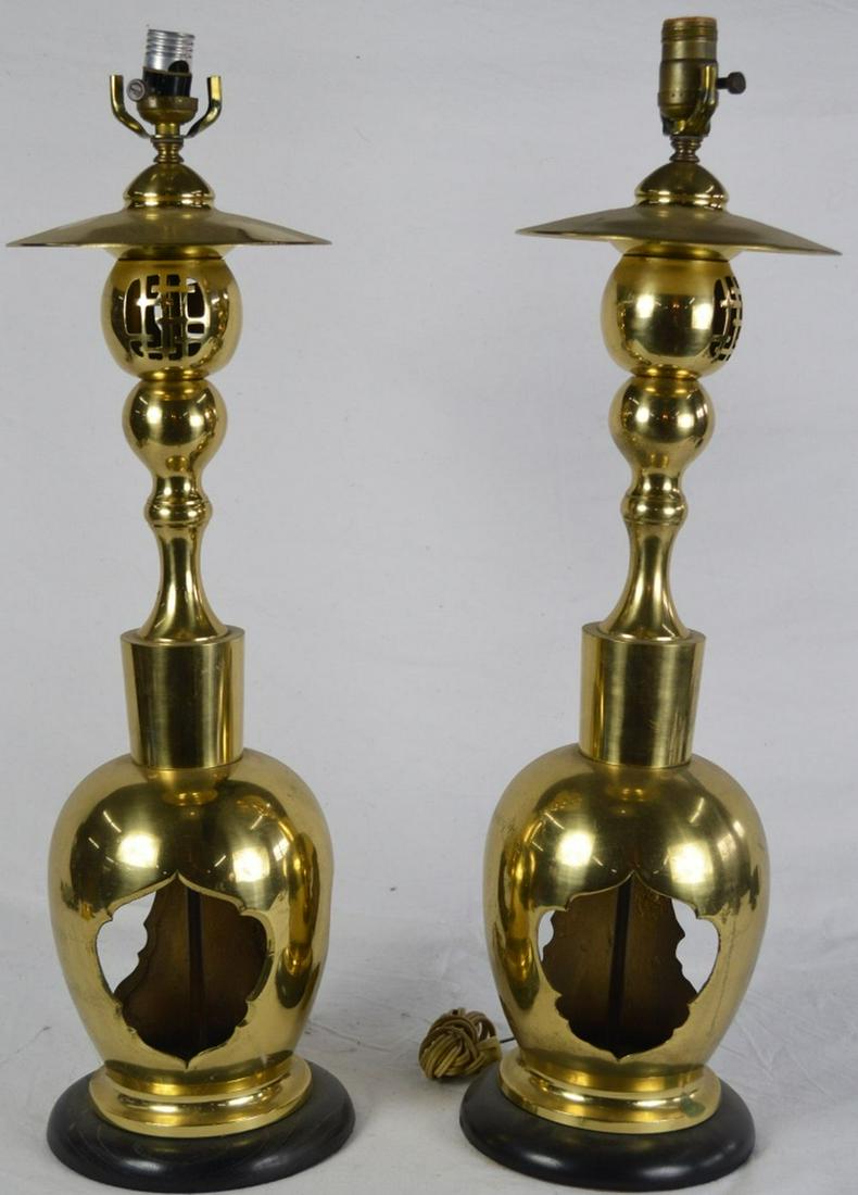 PAIR OF MODERN BRASS LAMPS: Fine pair of modern brass lamps / lighting. Mounted on a wooden base. Measures: H 26 1/2" x W 7 1/2" x H 7 1/2"