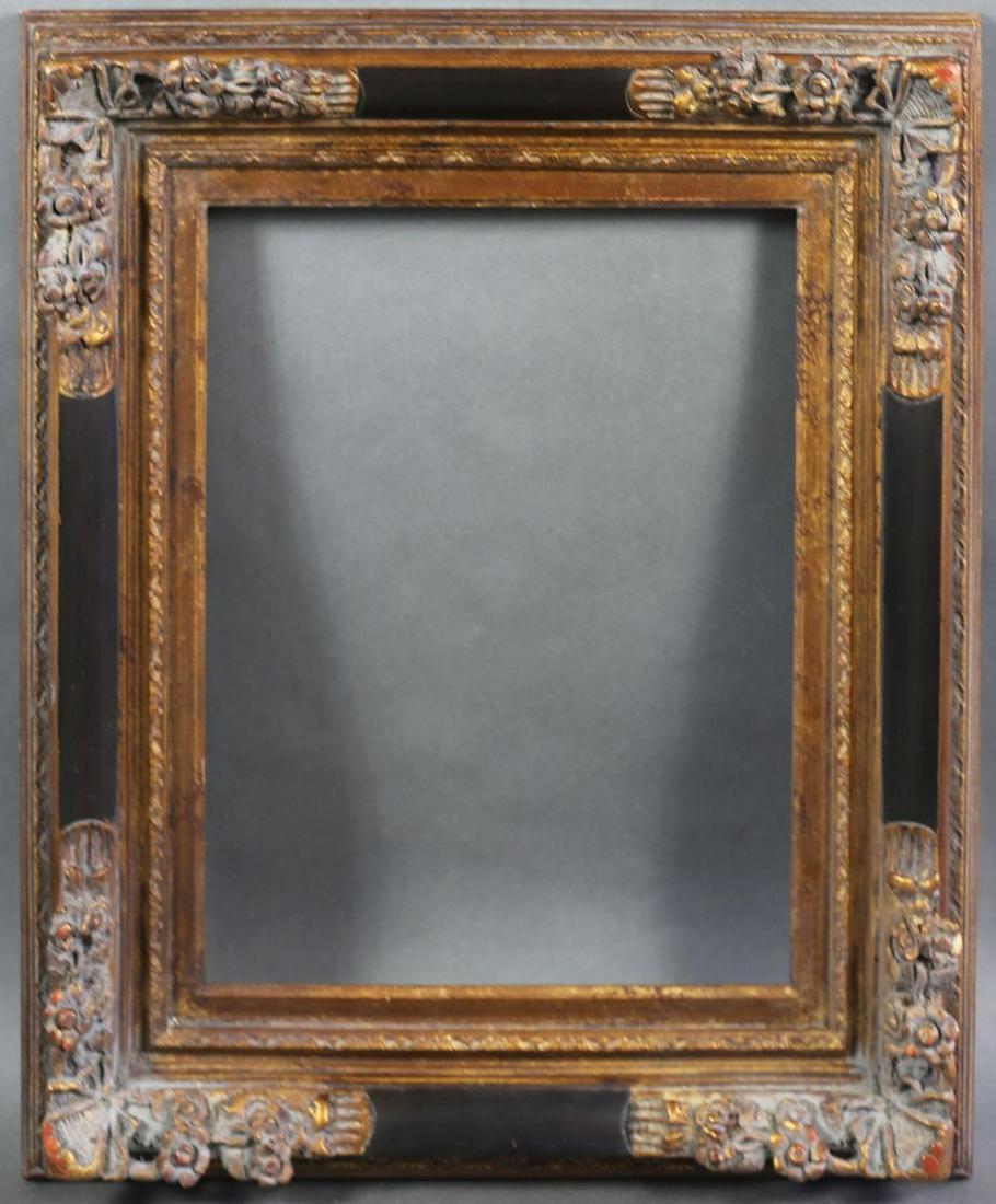 FRENCH STYLE GILT AND EBONIZED PAINTING FRAME: French style gilt and ebonized frame. Measures: 29" x 25" Rabbet: 20" x 16"