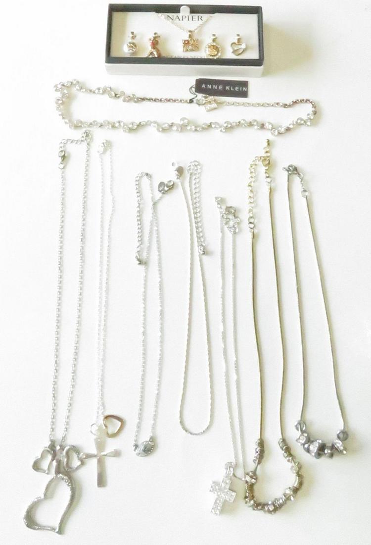 LOT FASHION JEWELRY NECKLACES INC SWAROVSKI: Lot of fashion necklaces including rhinestones, Swarovski 3D cross, Napier "changeable dog" theme, and Anne Klein