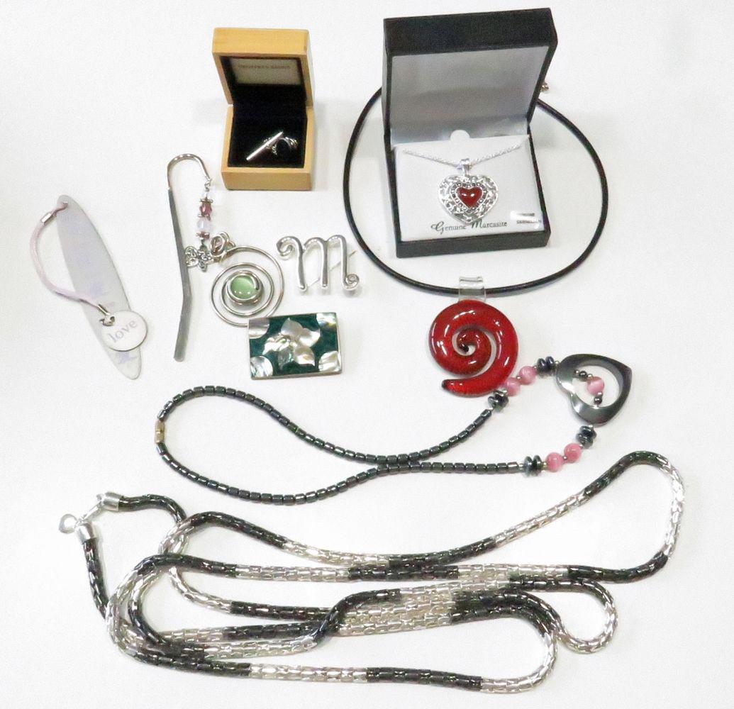 LOT FASHION JEWELRY CHOKER MARCASITE ETC: Lot of fashion jewelry including bookmarks, choker with art glass, necklace with Marcasite and Carnelian, Geoffrey Bean tie tack, brooches, etc.