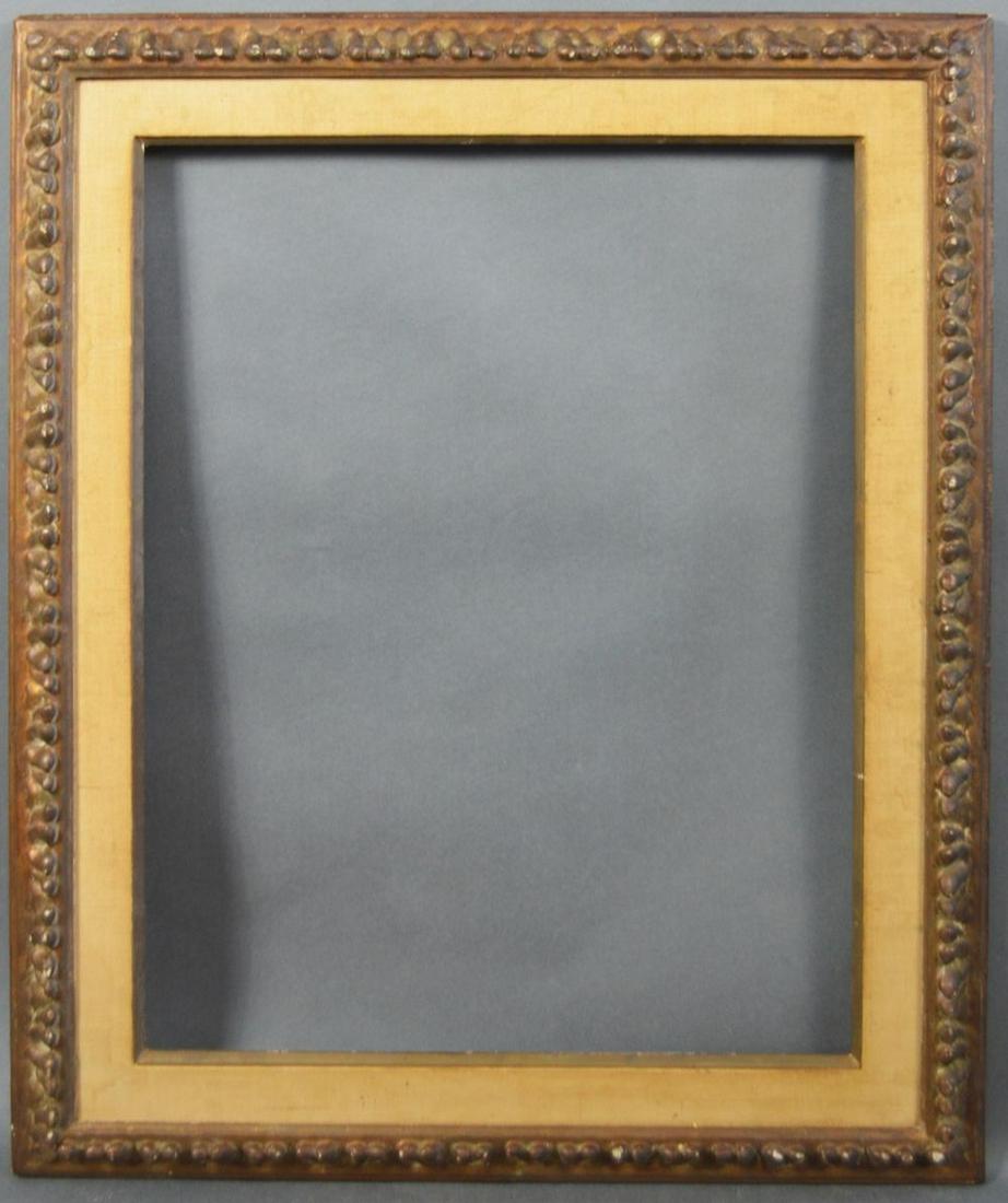 CARVED AND GILT FRAME: Carved and gilt frame with linen liner, 20th century. Measures: 30 1/2" x 24 1/2" Rabbet: 27 1/2" x 21 1/2"